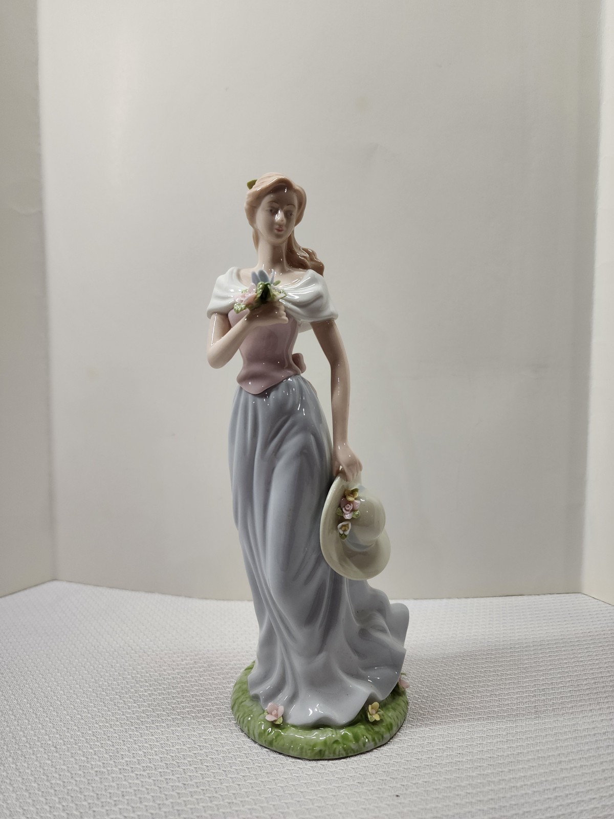 Avon Moments and Memories Kathleen A Spring Stroll Figurine Avon Moments and Memories Kathleen A Spring Stroll Figurine