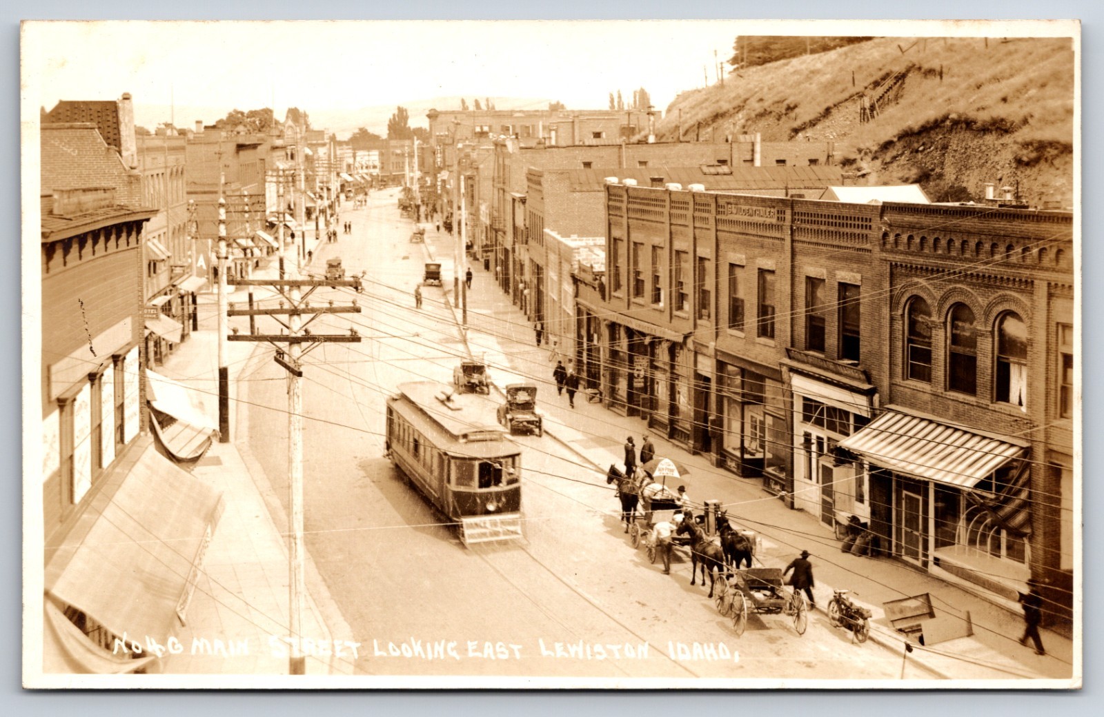Main Street Lewiston Idaho ID Trolley Motorcycle c1917 Real Photo RPPC