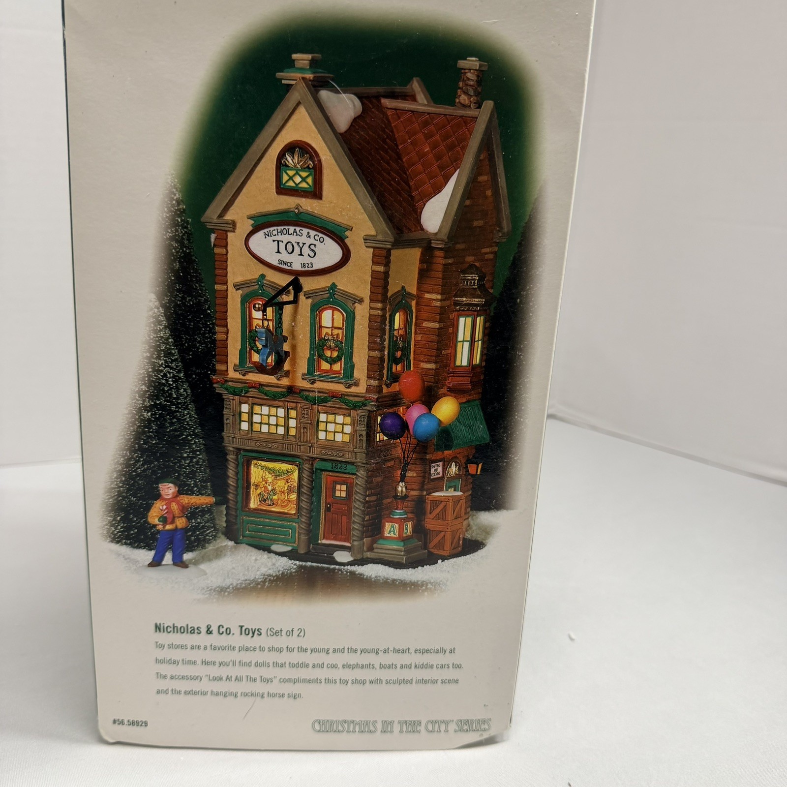 Dept 56 Xmas in the City Lighted Shop #58929 Nicholas & Co Toys *flawed Dept 56 Xmas in the City Lighted Shop #58929 Nicholas & Co Toys *flawed