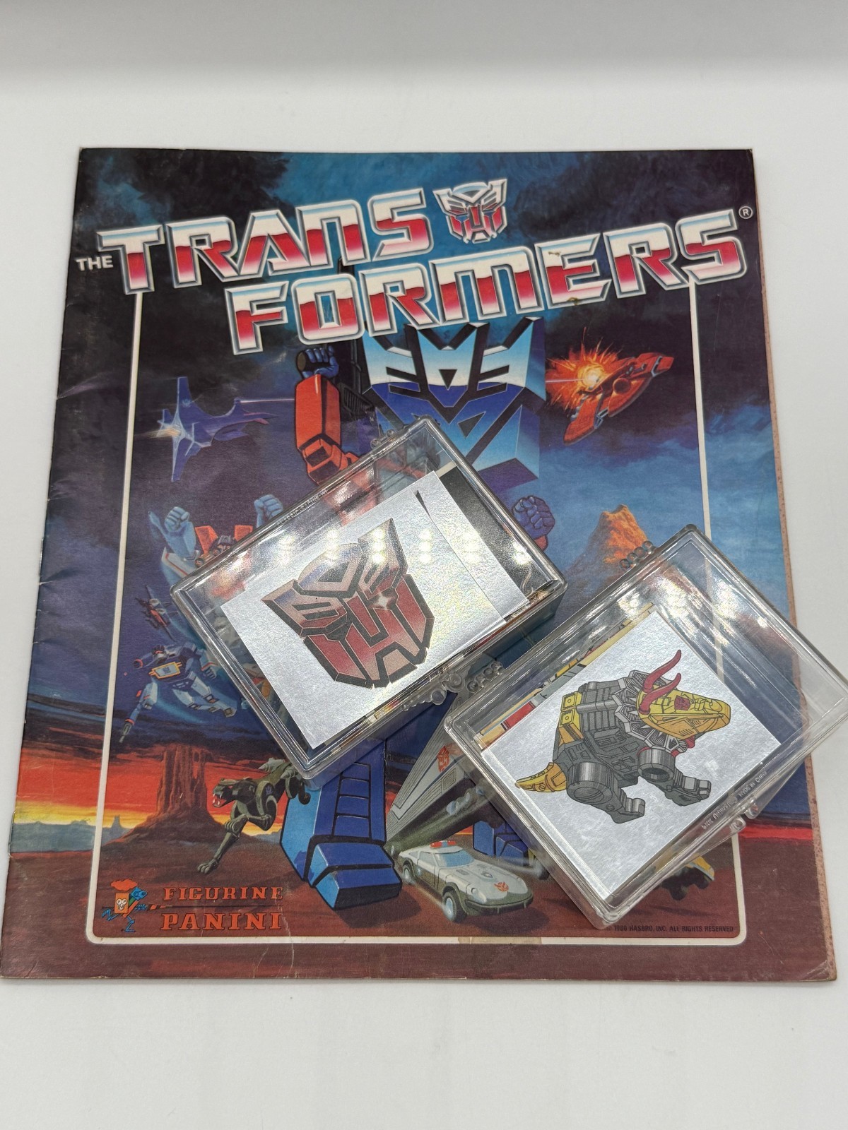 RARE Transformers 1986 Panini Album & COMPLETE un-used sticker set. RARE Transformers 1986 Panini Album & COMPLETE un-used sticker set.