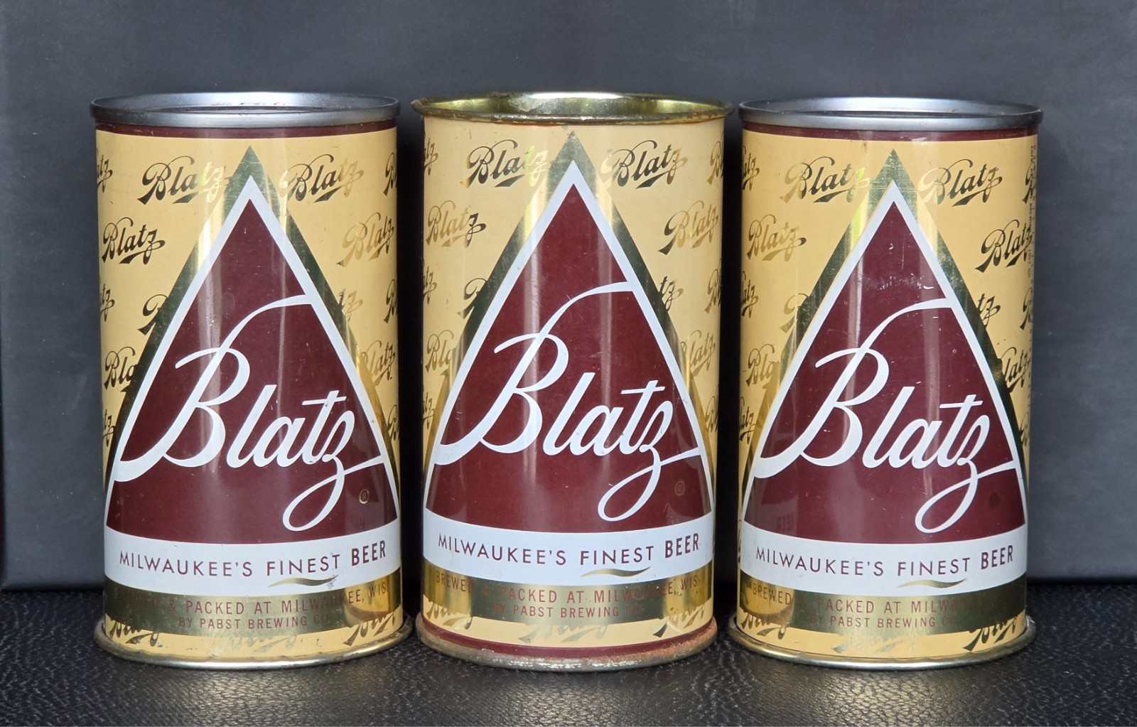TRIO OF 1960'S BLATZ FLAT TOP BEER CANS. ROLLED LIPS. NEVER FILLED. TRIO OF 1960'S BLATZ FLAT TOP BEER CANS. ROLLED LIPS. NEVER FILLED.