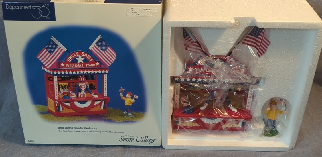 New Dept 56 Uncle Sam's Fireworks Stand Original Snow Village 54974-- N.I.B. New Dept 56 Uncle Sam's Fireworks Stand Original Snow Village 54974-- N.I.B.