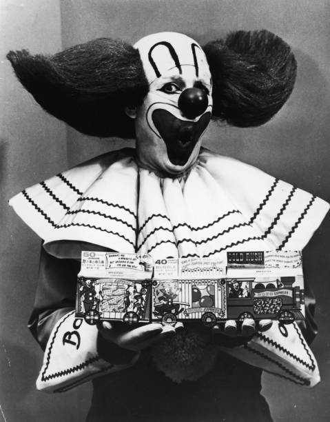Bozo the Clown holding boxes of Bozo Express Bazooka bubble gum - 1965 Old Photo