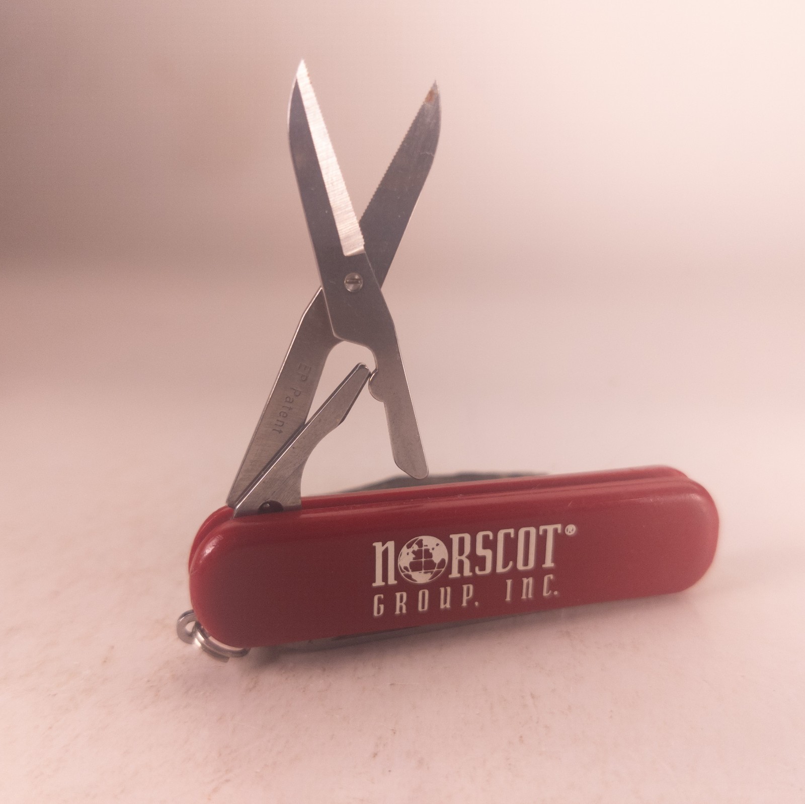 Swiss Army Knife Wenger Esquire Red 65mm Pocket Knife NORSCOT GROUP INC Logo