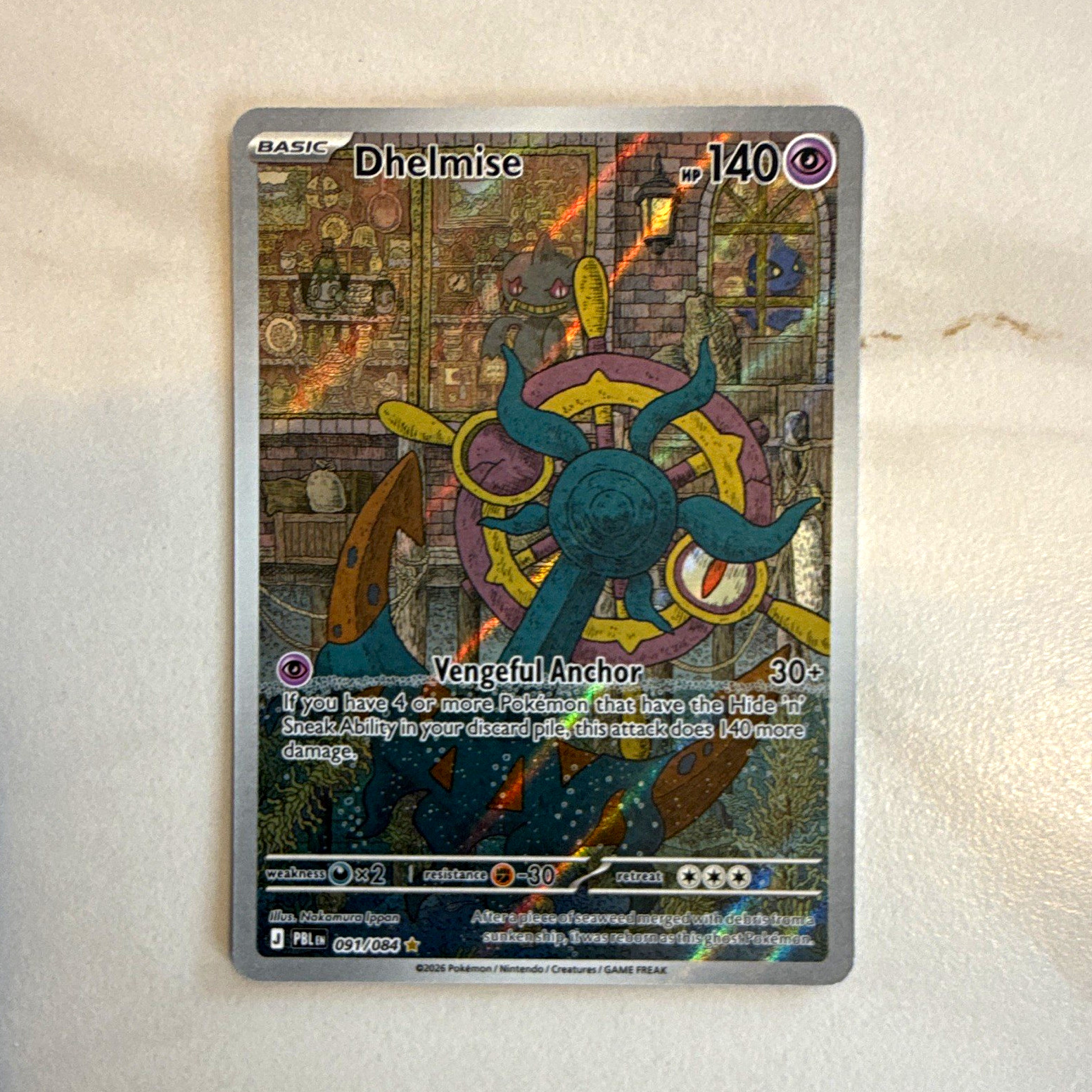 The Pokémon Company Dhelmise 091/091 Paldean Fates IR Holo Basic 140HP EN 2025