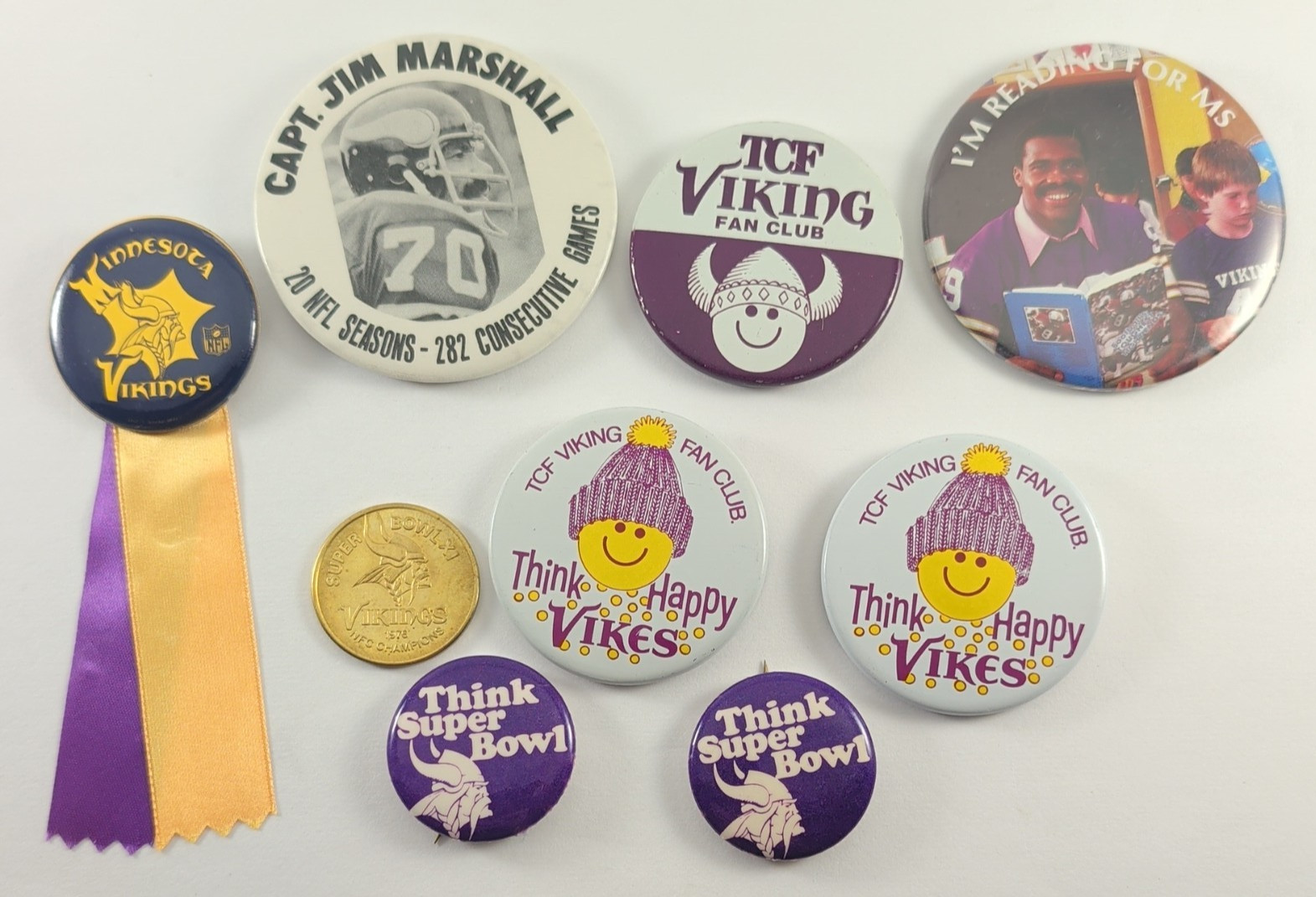Vintage Minnesota Vikings Pinback Button Lot w/ 1976 NFC Championship Brass Coin Vintage Minnesota Vikings Pinback Button Lot w/ 1976 NFC Championship Brass Coin