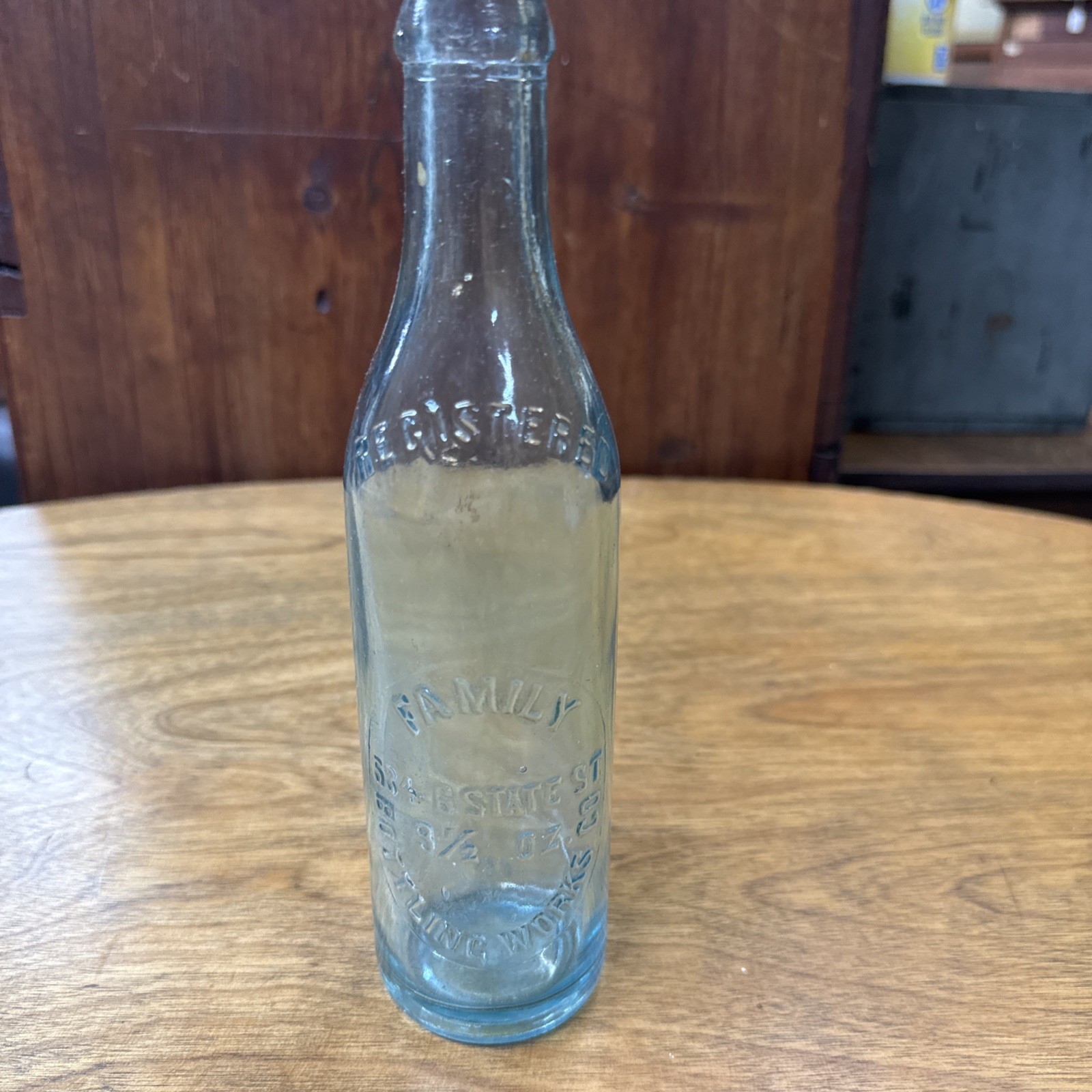 Vintage Family Bottling Wks. Rochester, NY 9 1/2 Oz Embossed Bottle State St Vintage Family Bottling Wks. Rochester, NY 9 1/2 Oz Embossed Bottle State St