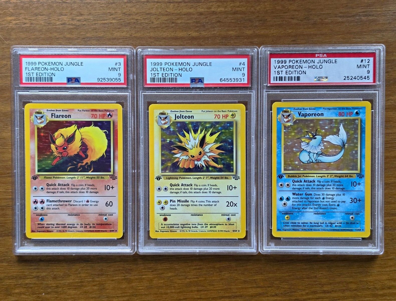 PSA 9 Pokémon 1999 Jungle 1st Edition Holo - Flareon/Jolteon/Vaporeon PSA 9 Pokémon 1999 Jungle 1st Edition Holo - Flareon/Jolteon/Vaporeon