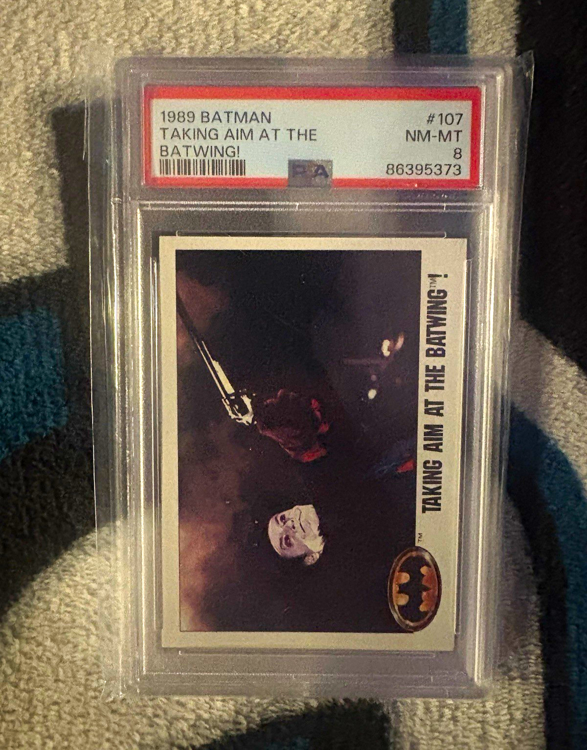 Topps 1989 Batman Taking Aim at the Batwing #107 Non-Sport Card PSA 8