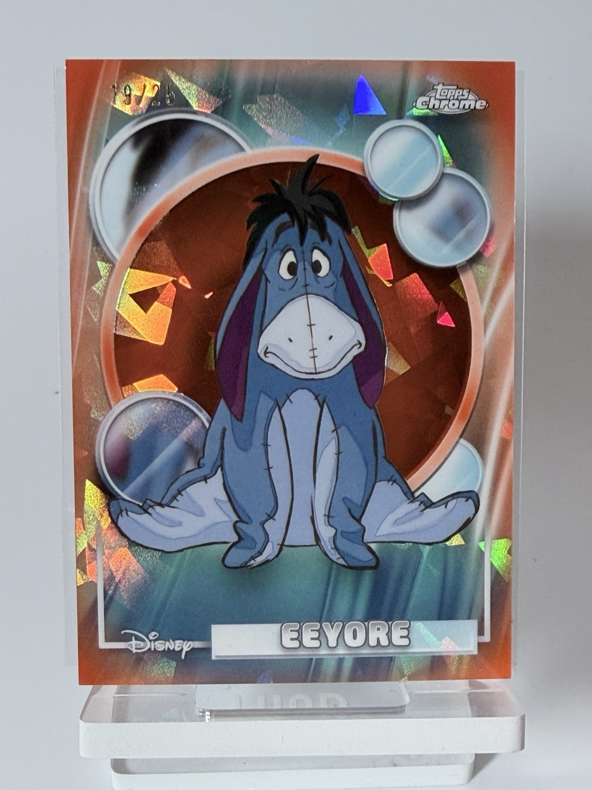 2026 Topps Chrome Sapphire Disney Eeyore Orange Refractor #/25 Perfect Card 2026 Topps Chrome Sapphire Disney Eeyore Orange Refractor #/25 Perfect Card