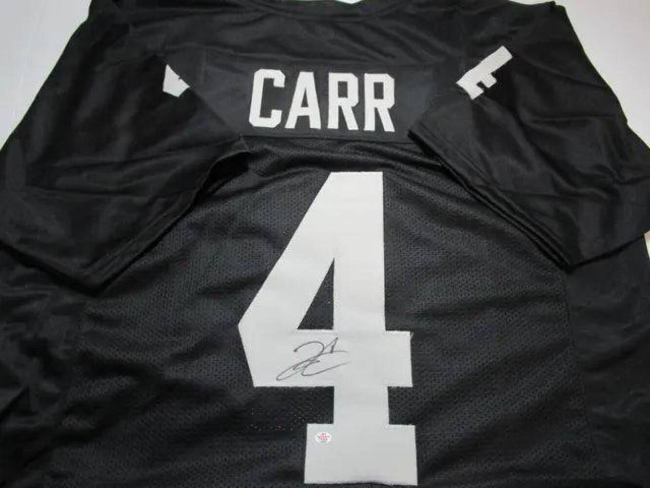 Derek Carr of the LV Raiders Autographed Football Jersey PAAS COA 277