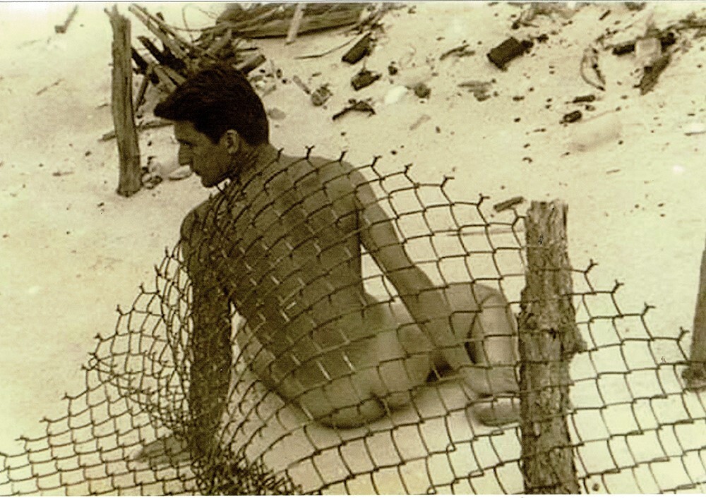 Beefcake model at the beach + fence 1960s Gay gentleman's collection reprint