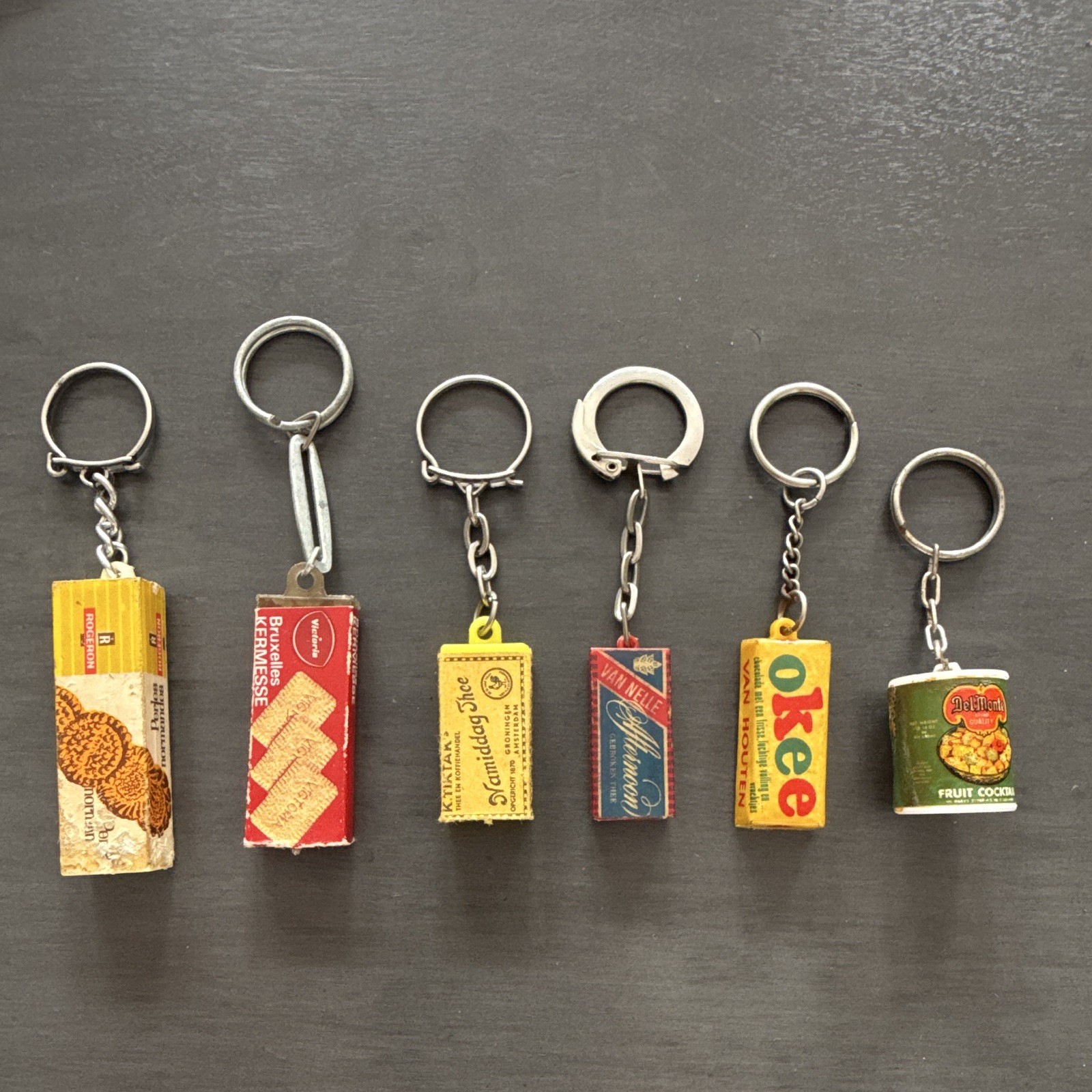Lot of 6 Vintage Advertising Metal Keychains - Okee Del Monte Fruit Cocktail