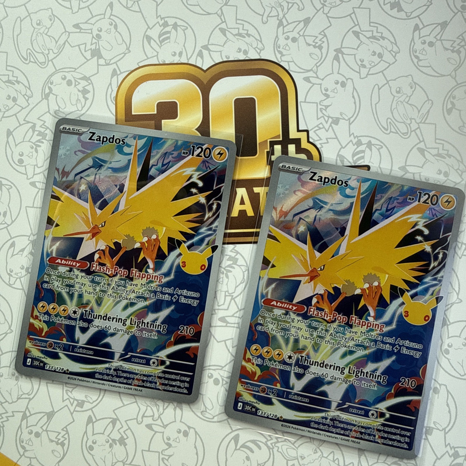 Pokémon Zapdos 133/128 30th Celebration Illustration Rare NM Pokémon Zapdos 133/128 30th Celebration Illustration Rare NM