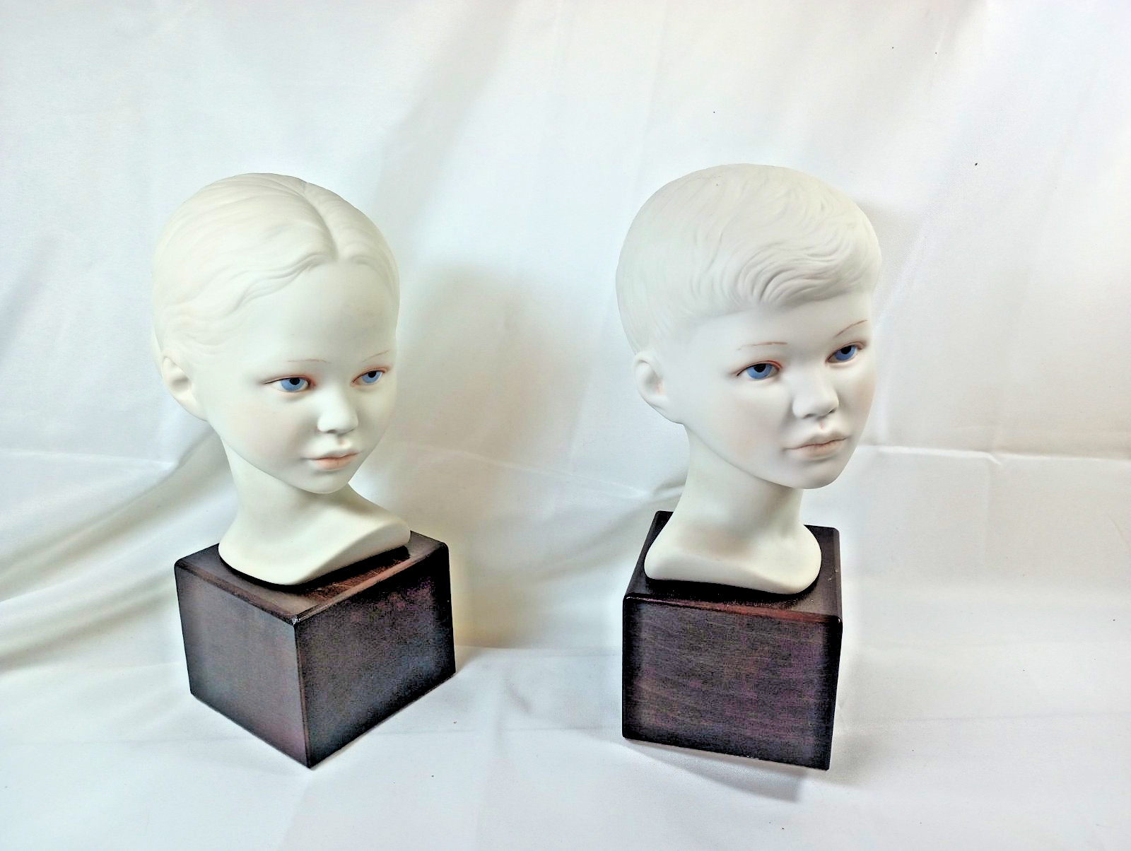 Cybis porcelain figures, boy & girl heads, c 1963. DS07