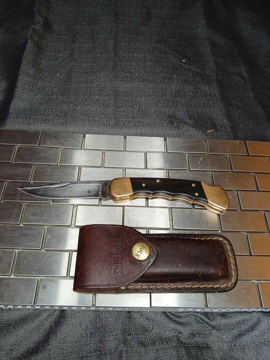 Vintage BUCK 110 4 dot folding pocket KNIFE USA 1980s w/Buck leather sheath