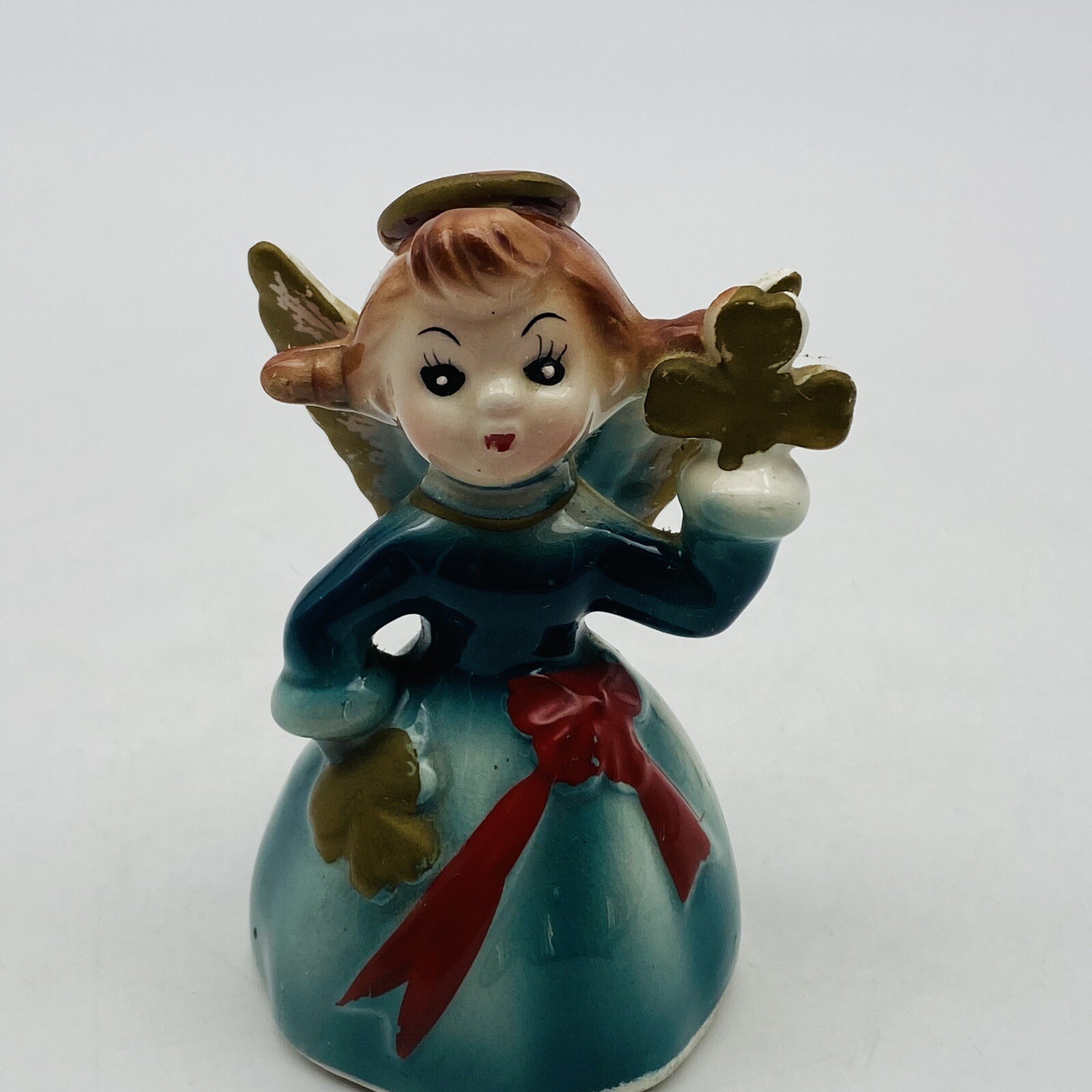 Vintage Ceramic Angel Bell holding Clover? Scarry Eyes Vintage Ceramic Angel Bell holding Clover? Scarry Eyes