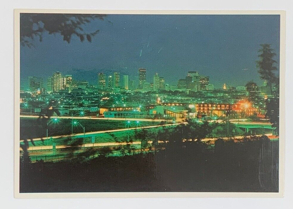 The Denver Metropolitan Area Mile High City at Night Colorado Postcard Unposted