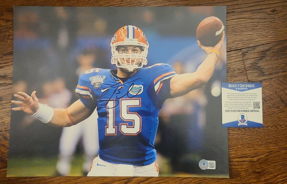 TIM TEBOW SIGNED 11X14 PHOTO FLORIDA GATORS BECKETT AUTHENTICATED #BB76041 WOW