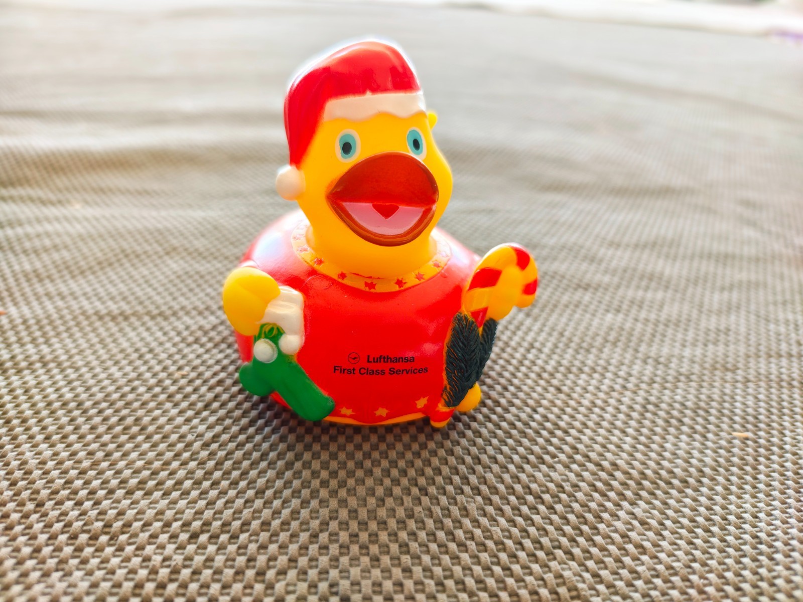 lufthansa first class duck Santa Claus with candy cane
