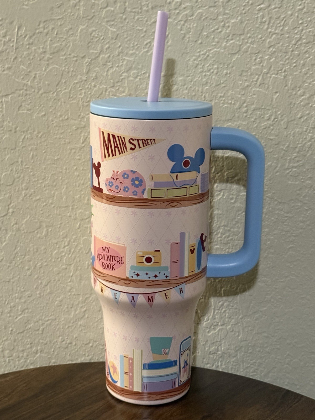 Disney Parks Main Street Monorail Bookshelf Dreamer Large 44oz Travel Tumbler Disney Parks Main Street Monorail Bookshelf Dreamer Large 44oz Travel Tumbler