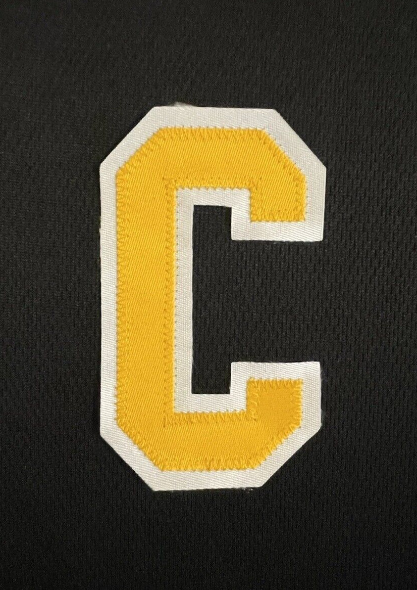 2020-25 Boston Bruins home or alternate black jersey Captain C Marchand Patch 2020-25 Boston Bruins home or alternate black jersey Captain C Marchand Patch
