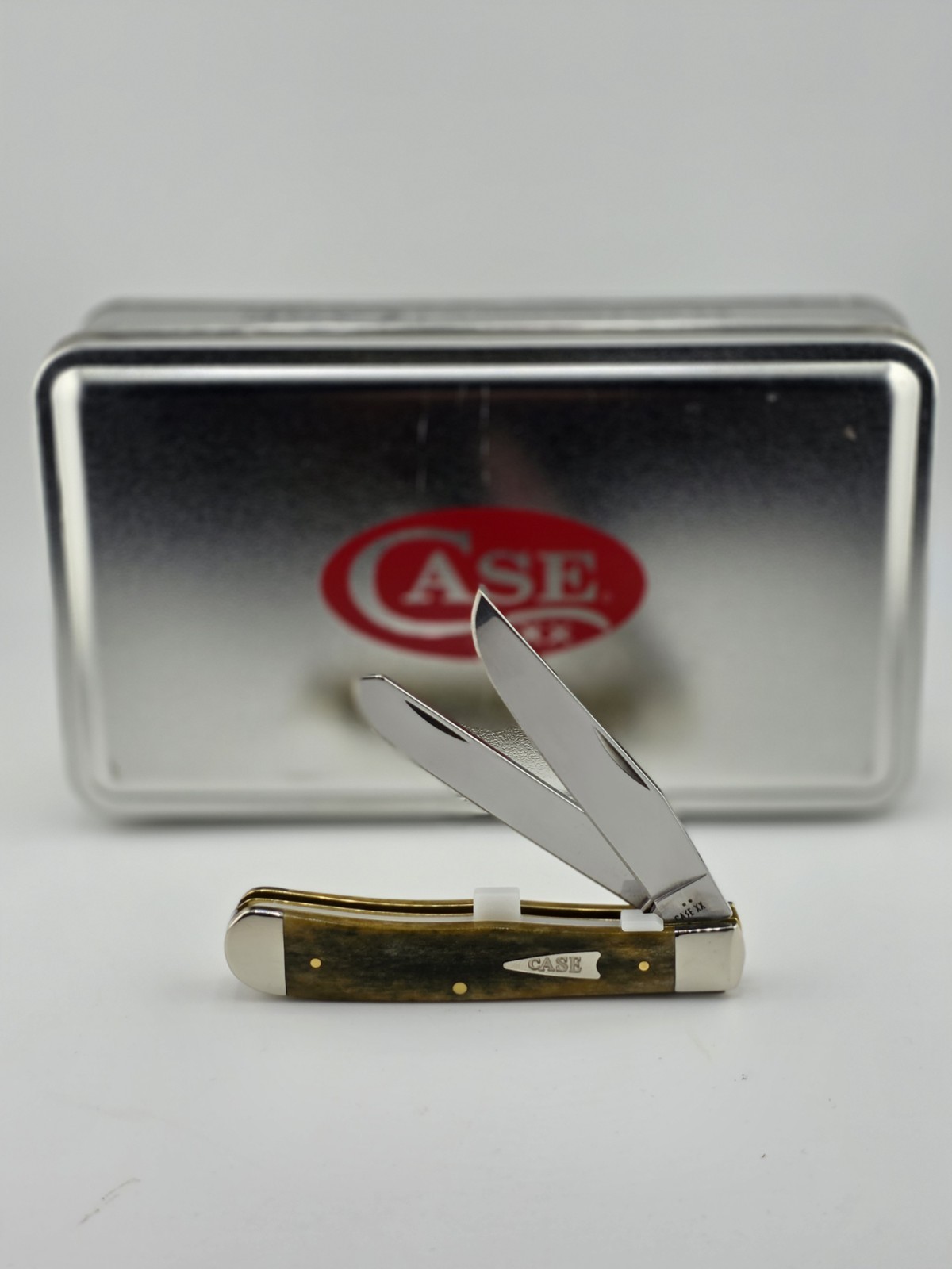 Case XX #10865 Olive Green Bone Smooth Trapper 6254 SS Tin Box Knife Case XX #10865 Olive Green Bone Smooth Trapper 6254 SS Tin Box Knife