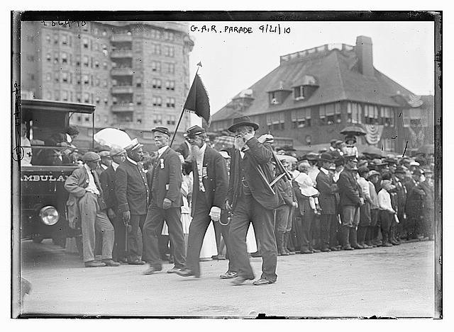 Photo:G.A.R. Parade Veterans Marching with Crowd 1910