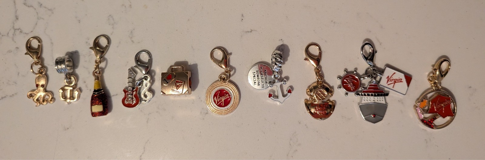 Virgin Voyages Cruise Line - Collection of 10 Charms - New Gold Tone/Silver Tone Virgin Voyages Cruise Line - Collection of 10 Charms - New Gold Tone/Silver Tone