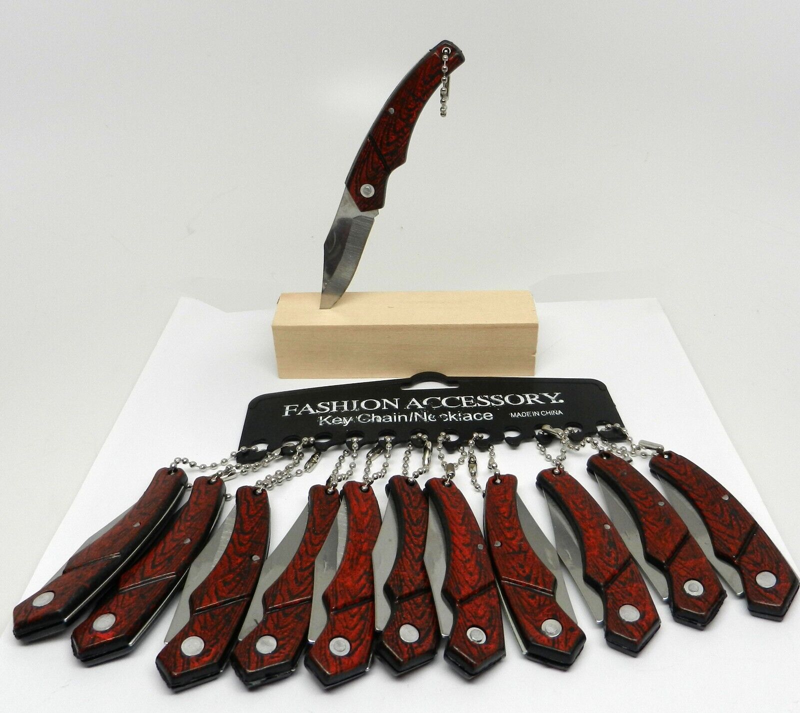One Dozen 12 total pocket folding knife keychain lot with retail resell display