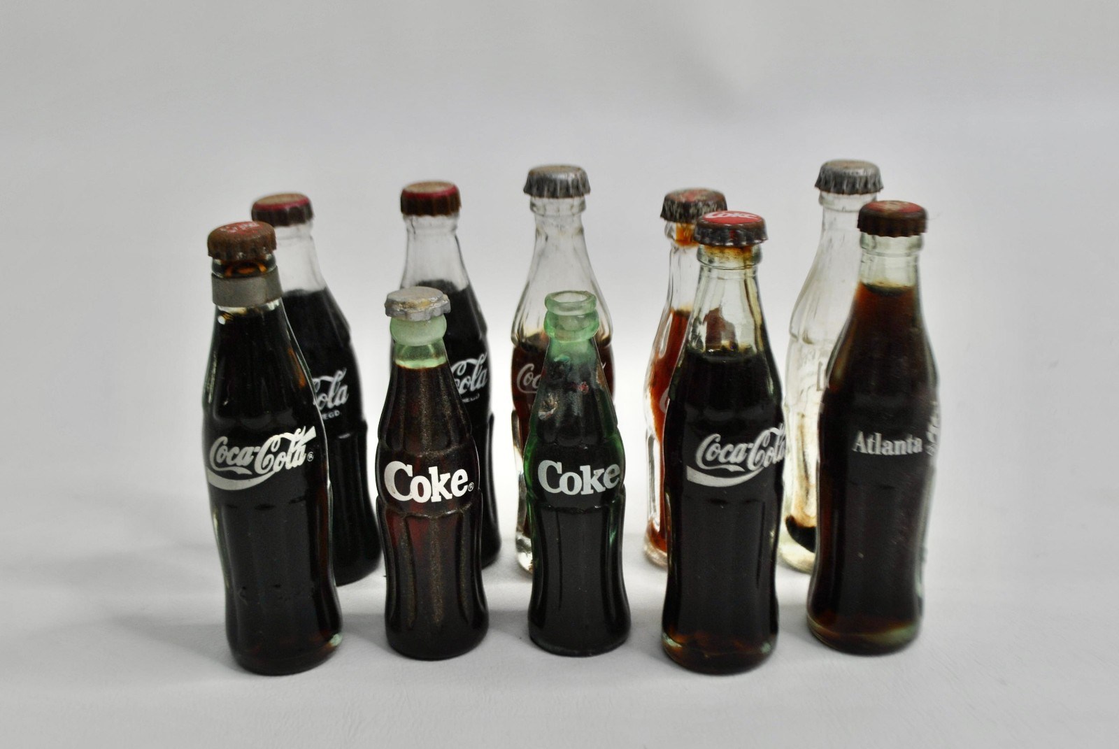 VTG 70'S MINIATURE COCA-COLA MINI GLASS BOTTLES SET OF 10 2.5 inches tall VTG 70'S MINIATURE COCA-COLA MINI GLASS BOTTLES SET OF 10 2.5 inches tall