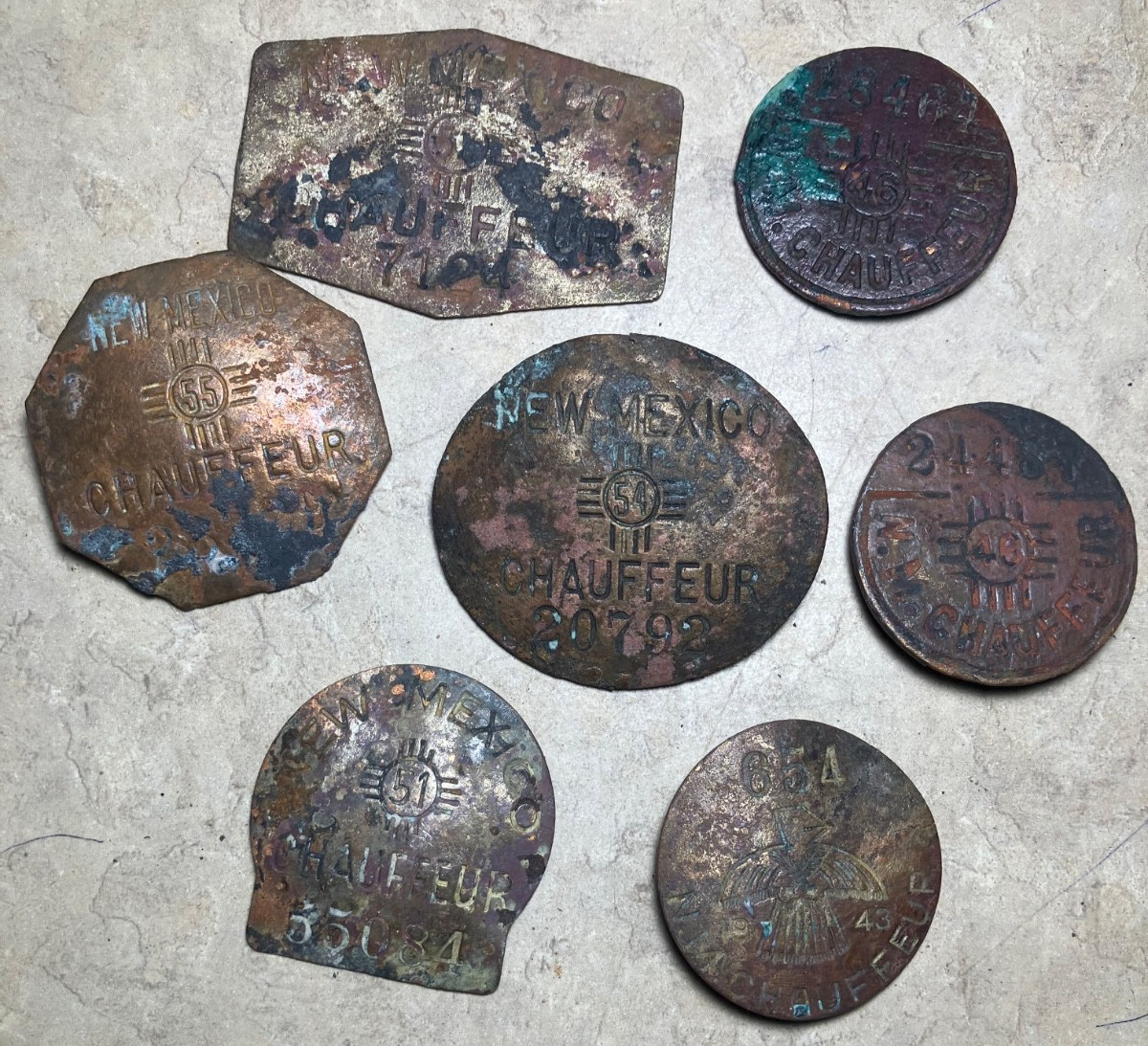 Seven various New Mexico chauffeur badges-New Mexico metal detecting finds
