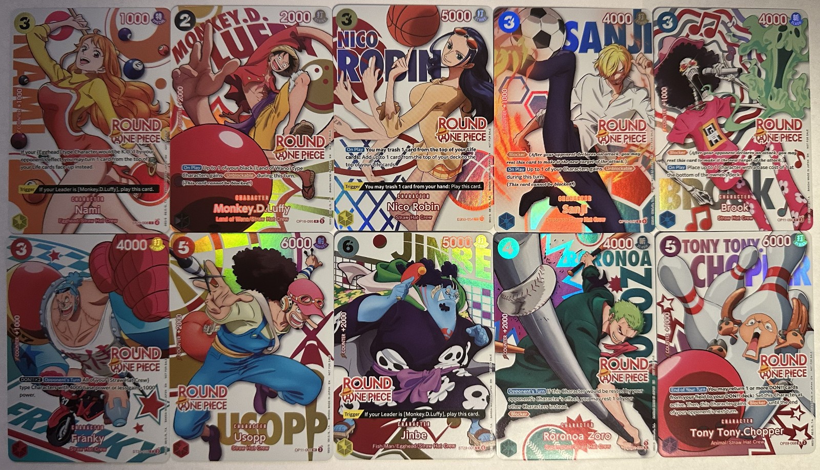 Round 1 x One Piece Promo Cards - Full Set of 10 English + 2 Keychains Round 1 x One Piece Promo Cards - Full Set of 10 English + 2 Keychains