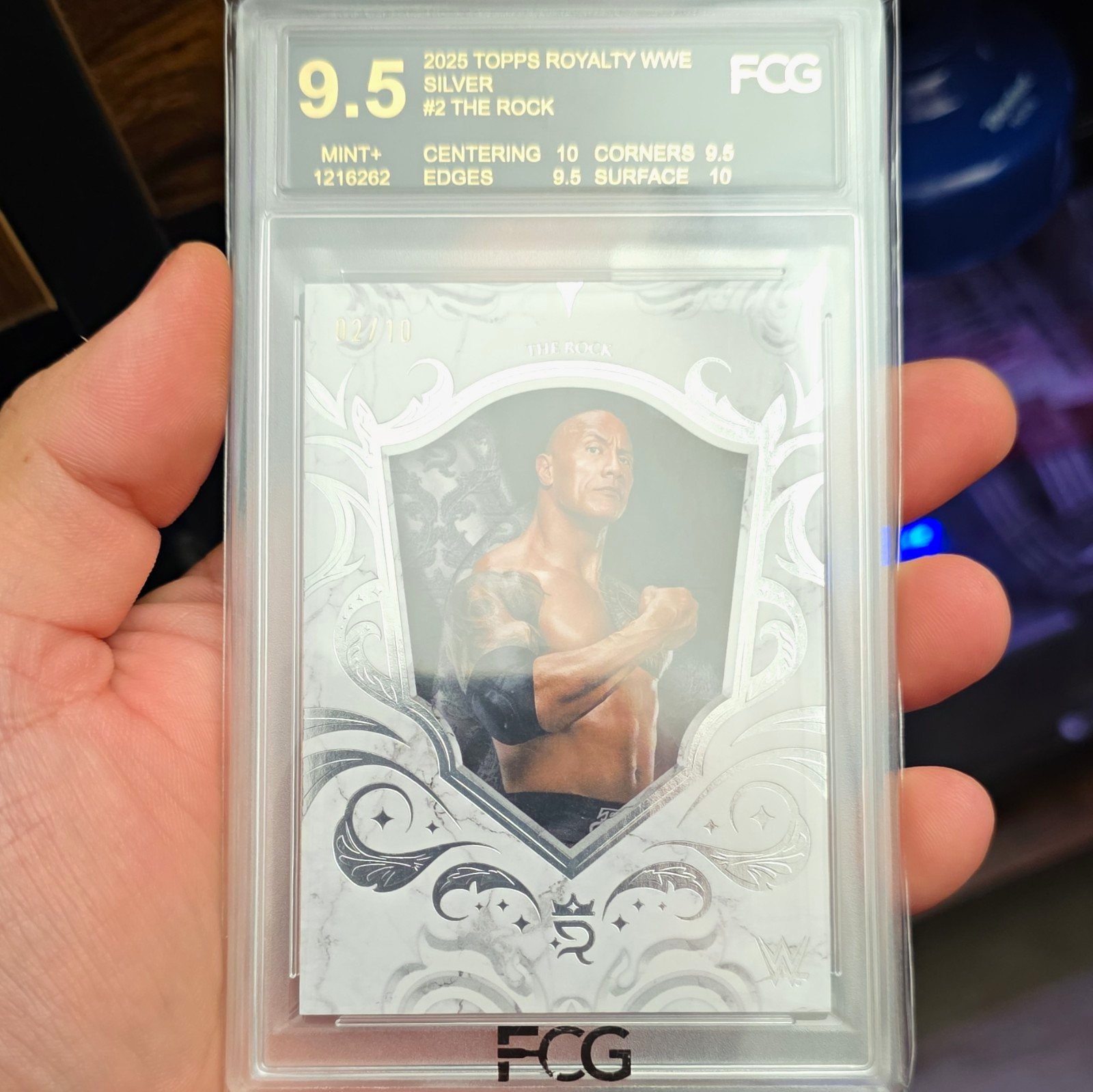 Topps 2025 Topps Royalty WWE The Rock Silver #002 Serial #/10 Card