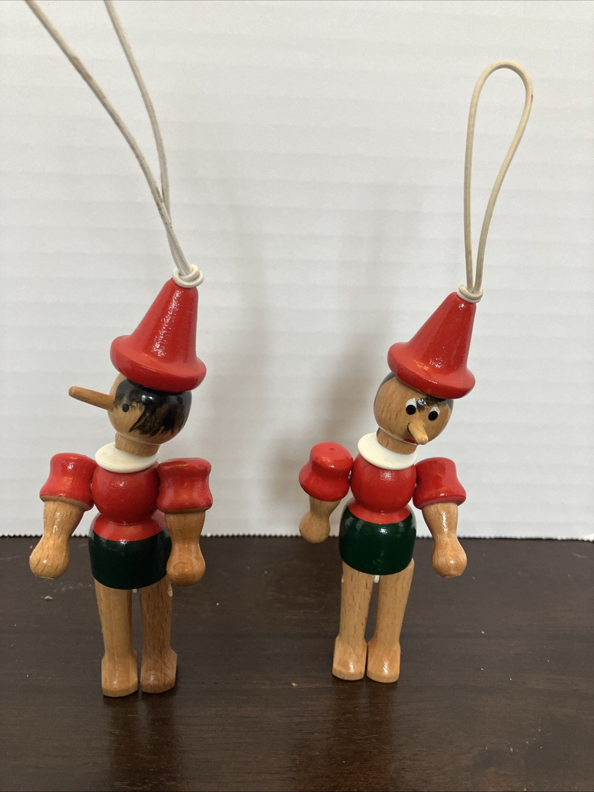 Title: Vintage Pair of Hand-Painted Wooden Pinocchio Hanging Ornaments 