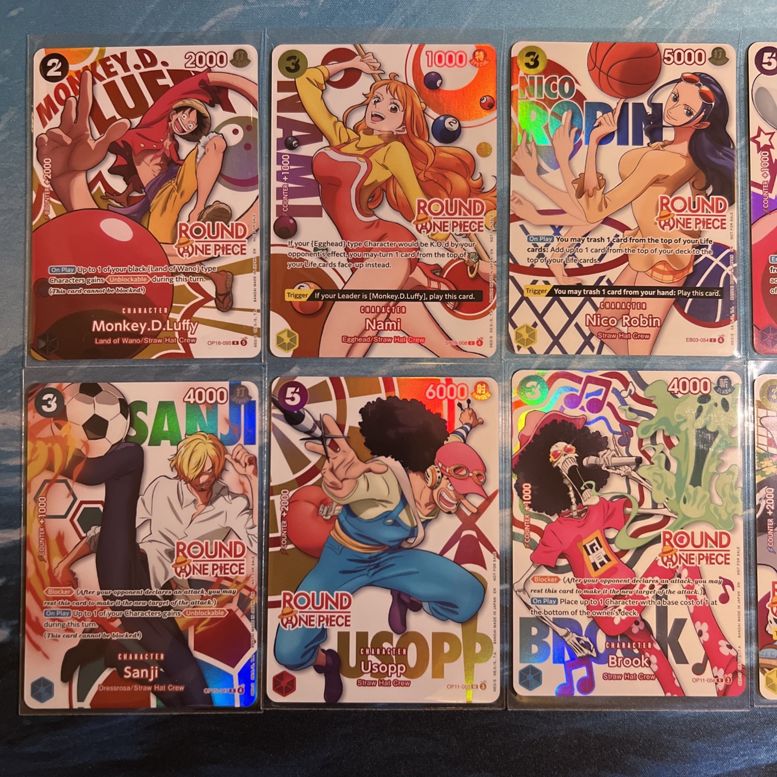 Round 1 x One Piece Promo Cards - Full Set of 10 English + 2 Keychains Round 1 x One Piece Promo Cards - Full Set of 10 English + 2 Keychains