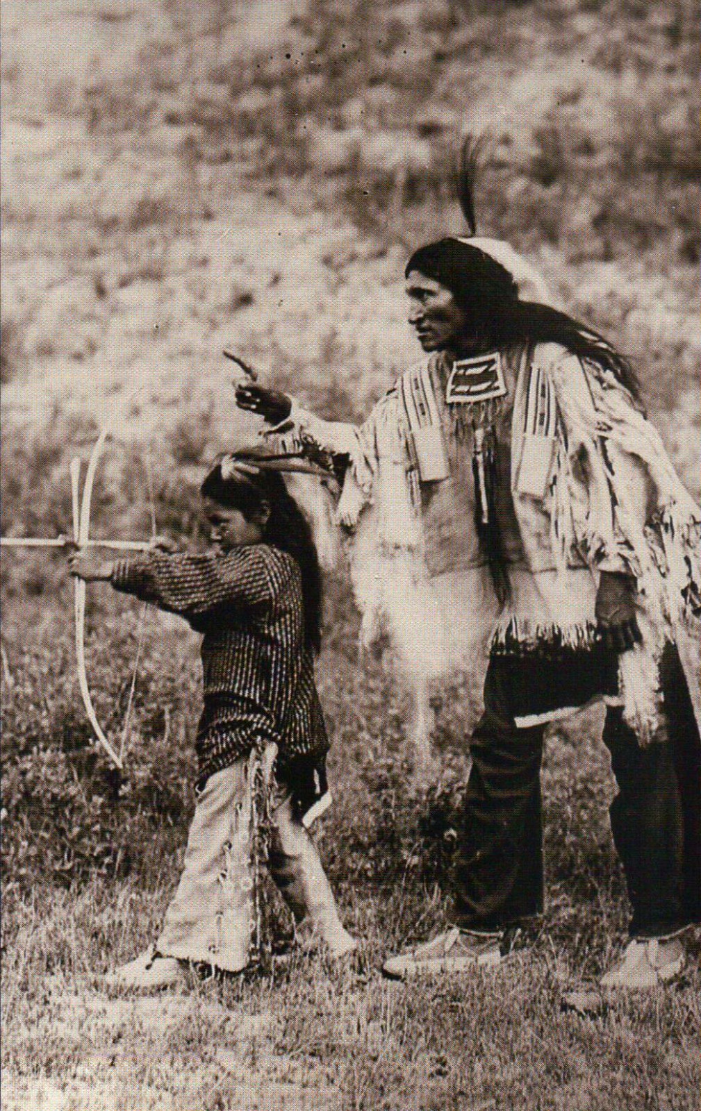 Kicking Bear Sioux Indian Teaches Son Bow & Arrow, Native American --- Postcard Kicking Bear Sioux Indian Teaches Son Bow & Arrow, Native American --- Postcard