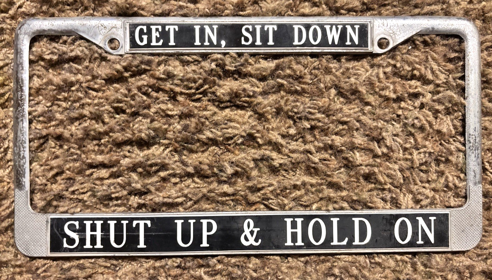 Vintage 'Get In, Sit Down, Shut Up & Hold' On License Plate Frame Vintage 'Get In, Sit Down, Shut Up & Hold' On License Plate Frame