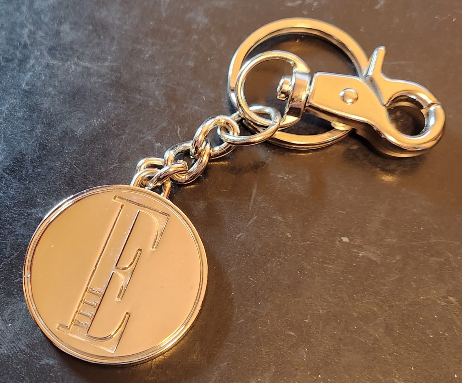 Vintage ELLE Magazine Silver Finish Metal Key Ring / Key Chain Vintage ELLE Magazine Silver Finish Metal Key Ring / Key Chain