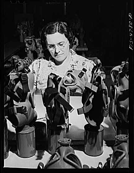 Edgewood Arsenal, Maryland. Gas demonstration. Reconditioning gas masks for
