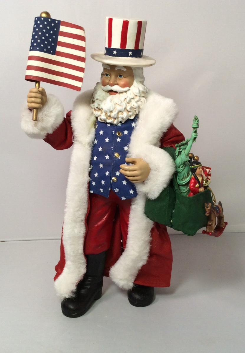 KSA Inc Patriotic Santa Uncle Sam, 11.5” Tall Uncle Sam Attire w/ American Flag KSA Inc Patriotic Santa Uncle Sam, 11.5” Tall Uncle Sam Attire w/ American Flag