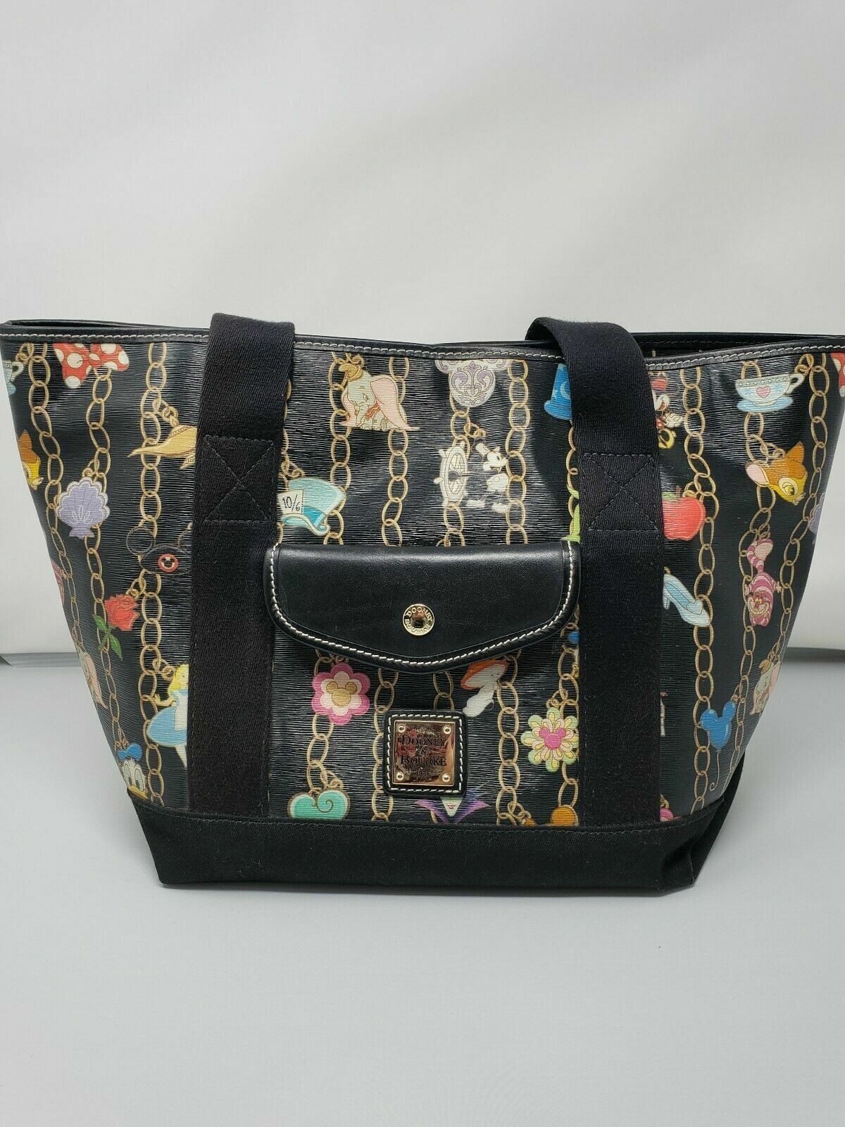 RARE Disney Dooney And Bourke Black Charms Pocket Tote EUC RARE Disney Dooney And Bourke Black Charms Pocket Tote EUC
