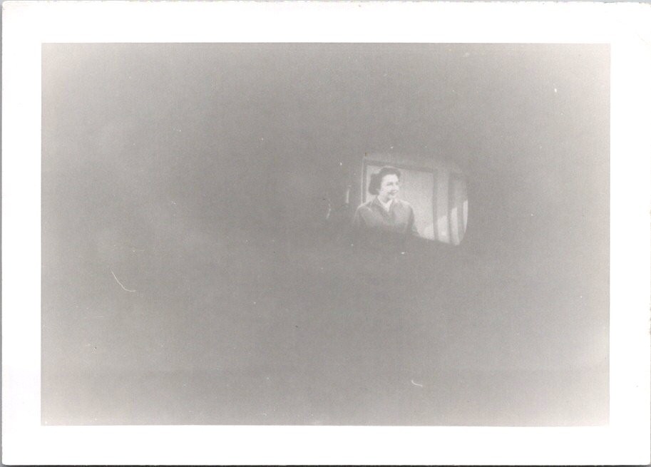 Smiling Woman on Television Screen Black & White Photograph Snapshot Photo Smiling Woman on Television Screen Black & White Photograph Snapshot Photo