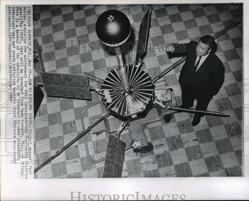 1965 Press Photo Paul Butler, Project Manager Explains Assignment for IMP