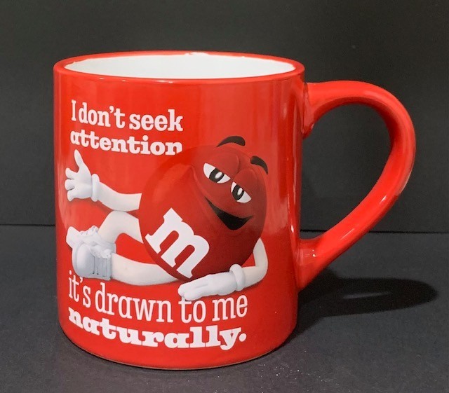 Nice Red M&M Coffee Mug “I Don't Seek Attention It's Drawn To Me Naturally” Nice Red M&M Coffee Mug “I Don't Seek Attention It's Drawn To Me Naturally”