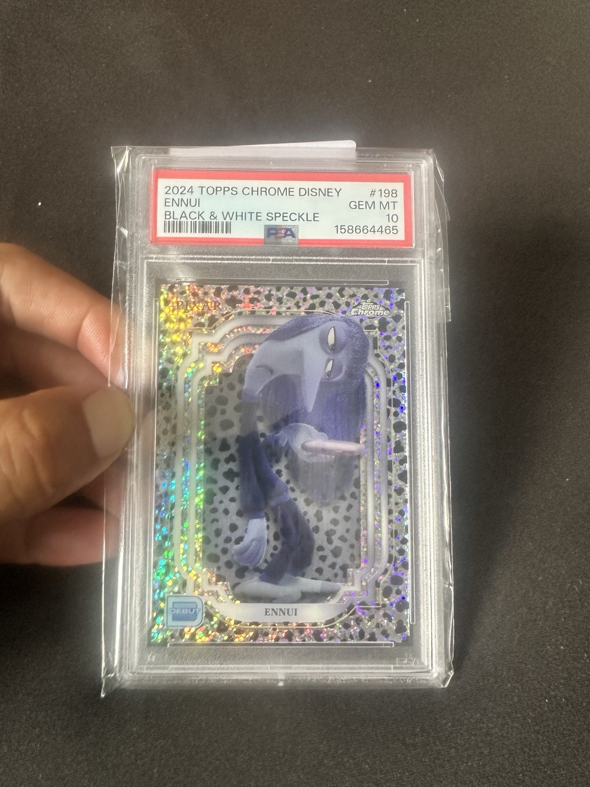Topps 2024 Topps Chrome Disney Ennui #198 Black & White Speckle Parallel Topps 2024 Topps Chrome Disney Ennui #198 Black & White Speckle Parallel
