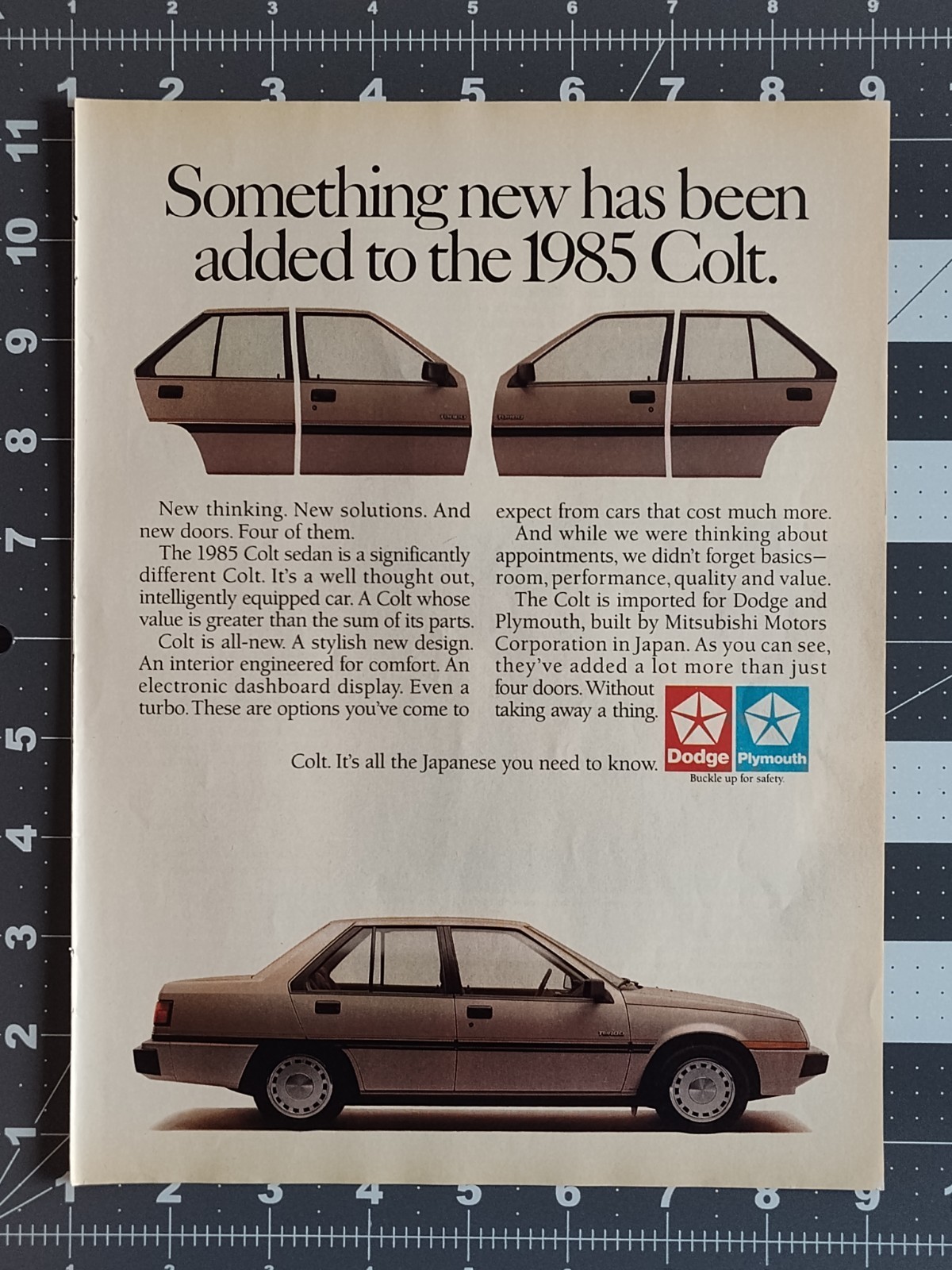 Vintage 1985 Dodge Plymouth Colt Turbo 4 Door Mitsubishi Original Magazine Ad