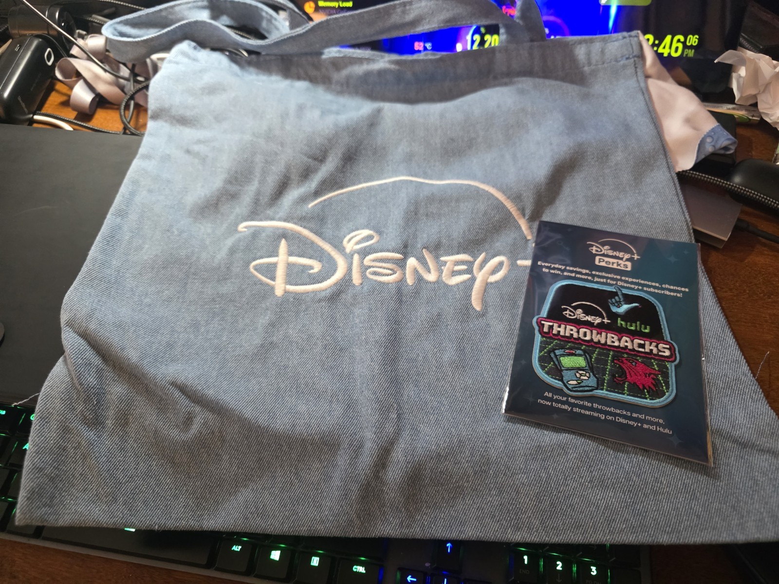2026 D23 Disney+ Exclusive Perks Throwback Disney+ Hulu Bag & Patch 2026 D23 Disney+ Exclusive Perks Throwback Disney+ Hulu Bag & Patch
