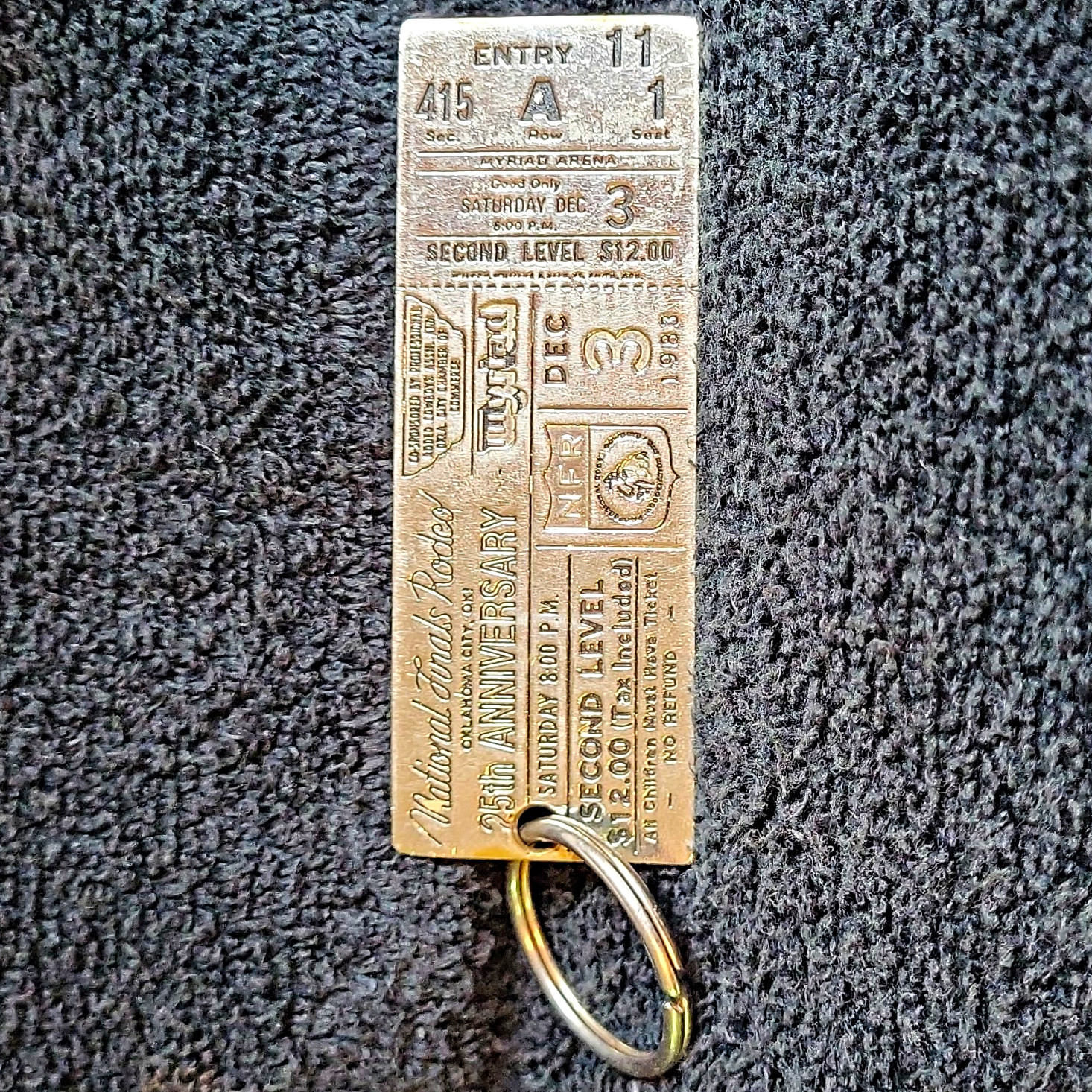 National Finals Rodeo NFR 25th Anniversary Metal Engraved Ticket Keychain Silver National Finals Rodeo NFR 25th Anniversary Metal Engraved Ticket Keychain Silver