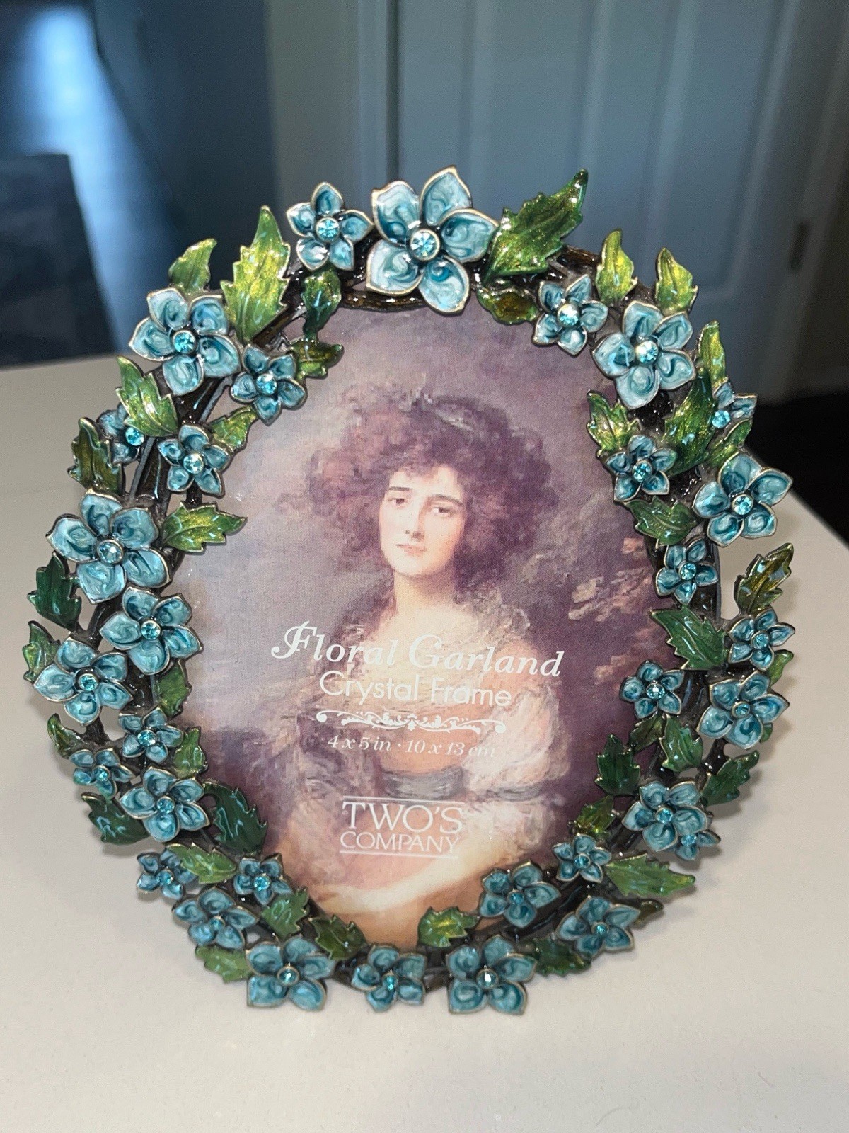 Two's Company Oval Floral Garland Enamel Crystal Picture Frame Two's Company Oval Floral Garland Enamel Crystal Picture Frame